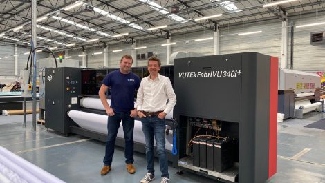 CMYUK in Vutek installation hat trick